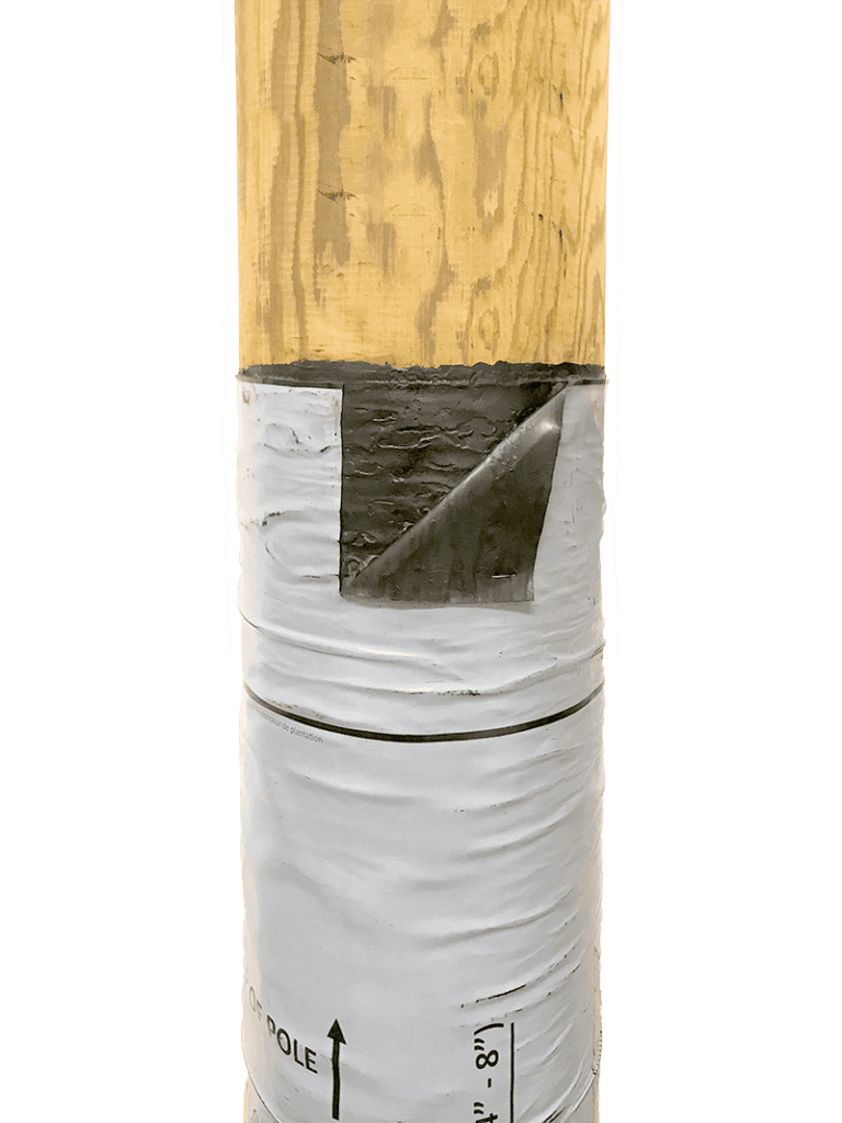 Image showing a cut-away of a Polesaver sleeve on a wooden utility pole