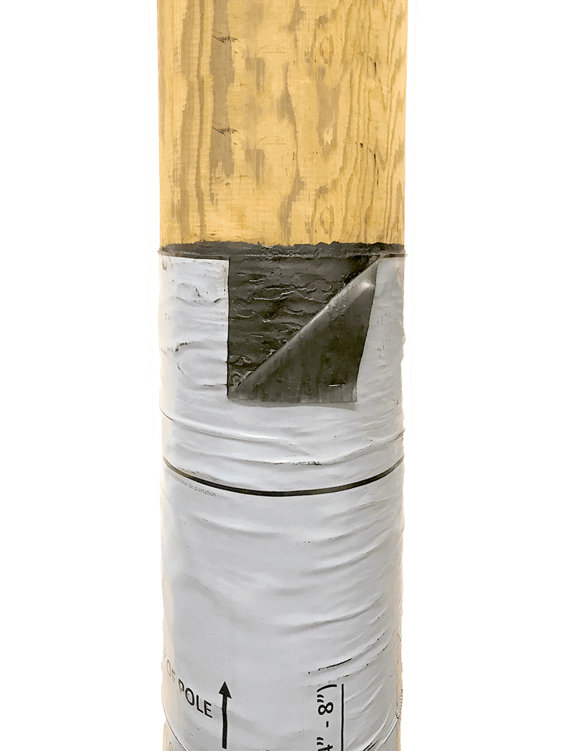 Image showing a cut-away of a Polesaver sleeve on a wooden utility pole
