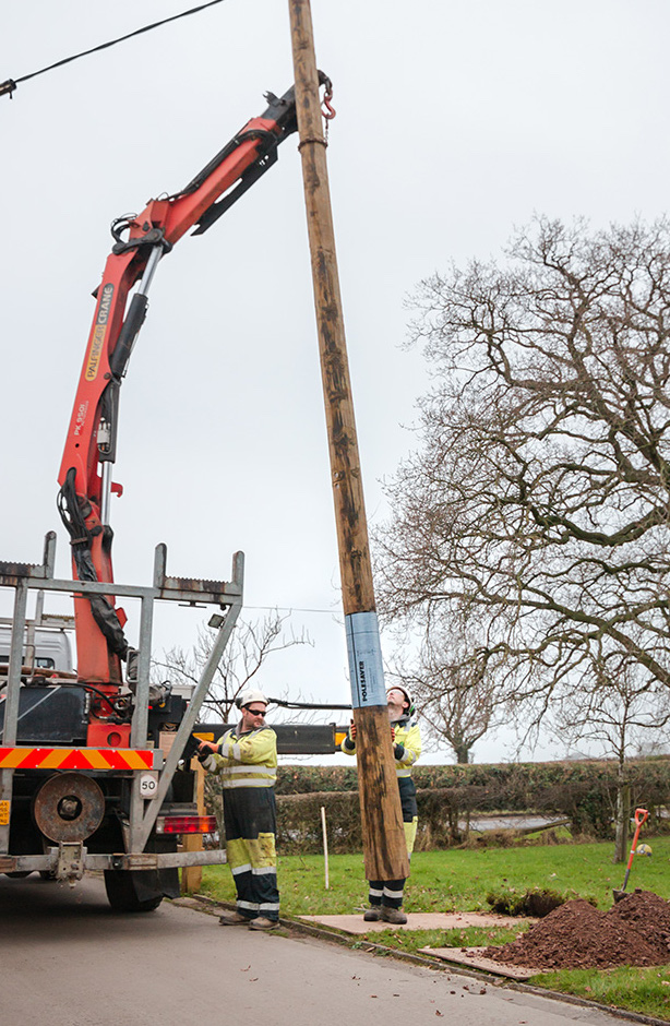 Polesaver protected pole being lifted off the truck