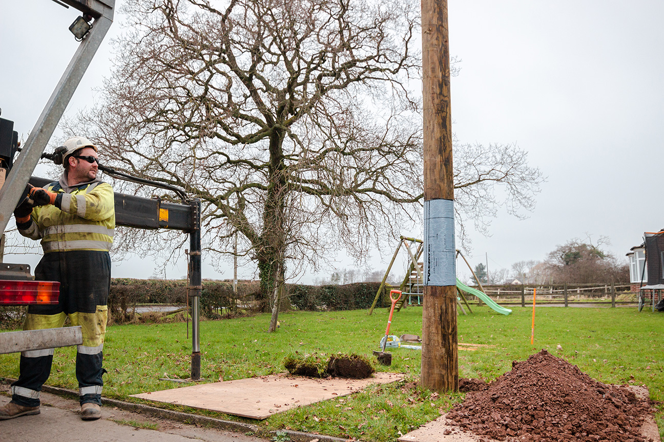 Polesaver protected pole being installed